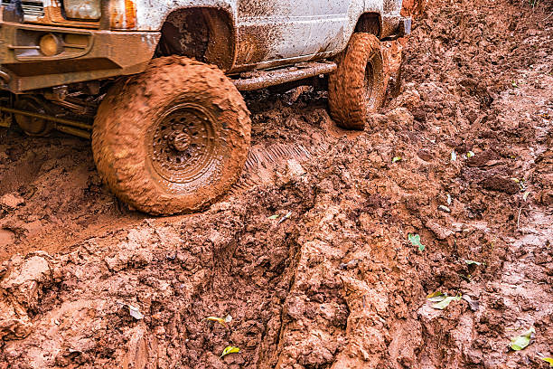 Tire tracks on a muddy road in the countryside, Routing traffic in the countryside.