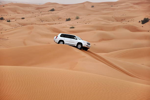 jeep safari in the sand dunes of the arabian desert. Dubai, UAE.
