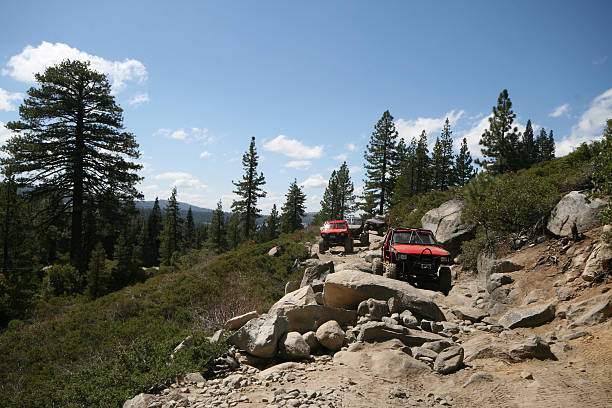 4 Wheel Drive trucks on a scenic rugged mountain road in Nevada.